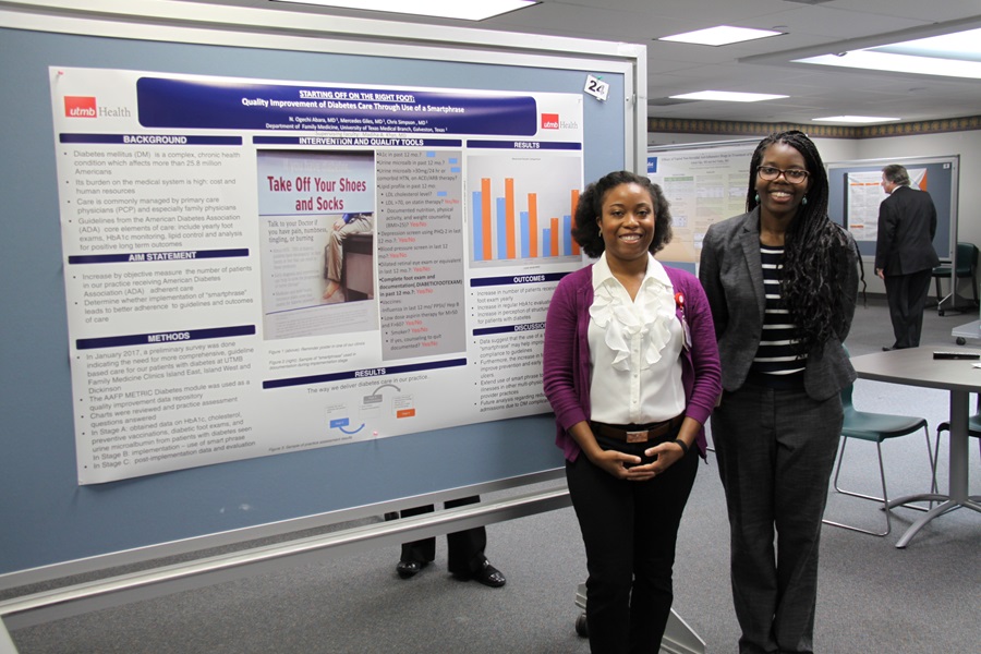 Dr. Giles and Dr. Abarra present poster at Annual Research Symposium